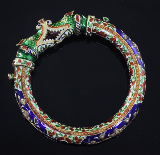 An Indian gold, enamel and multi gem set bangle,